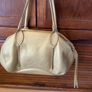 Women’s Express gold leather handbag. Very nice condition.